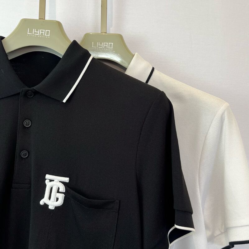 Logotipo de Homem - Camiseta de Polo bordada.